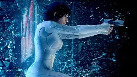 Live-action GiTS Major jumping through glass and firing a pistol